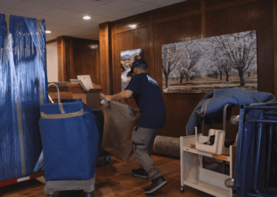 Expert is providing professional packing and furniture wrapping services for relocation